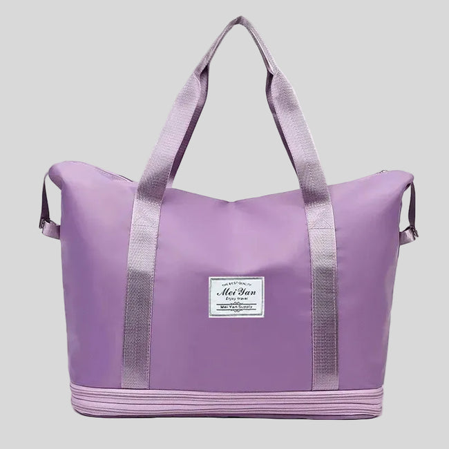 ExpandForm Weekender Bag in lavender front view with structured silhouette and dual handles