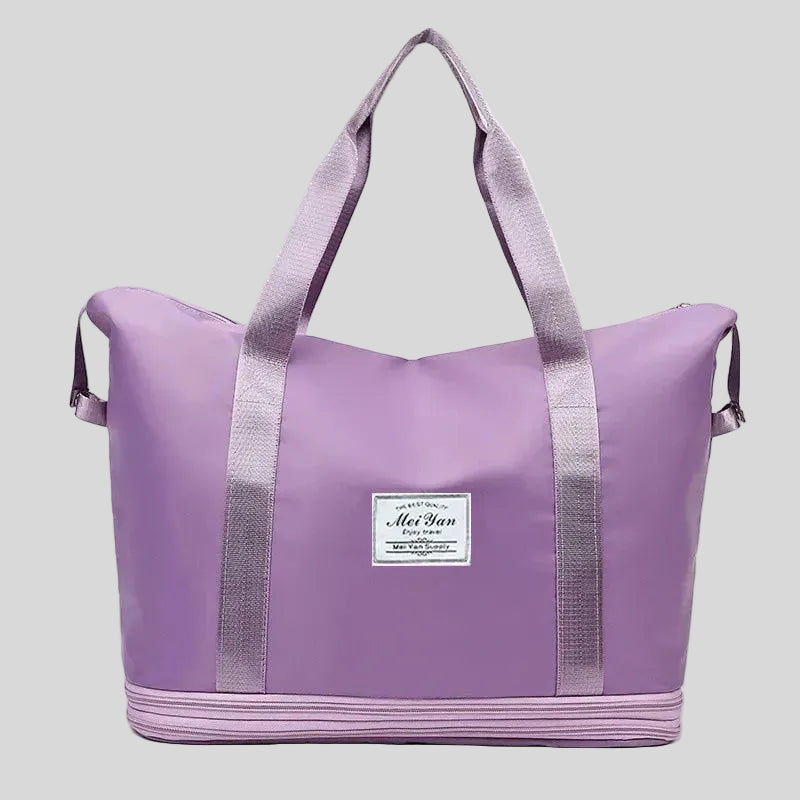 ExpandForm Weekender Bag in lavender front view with structured silhouette and dual handles