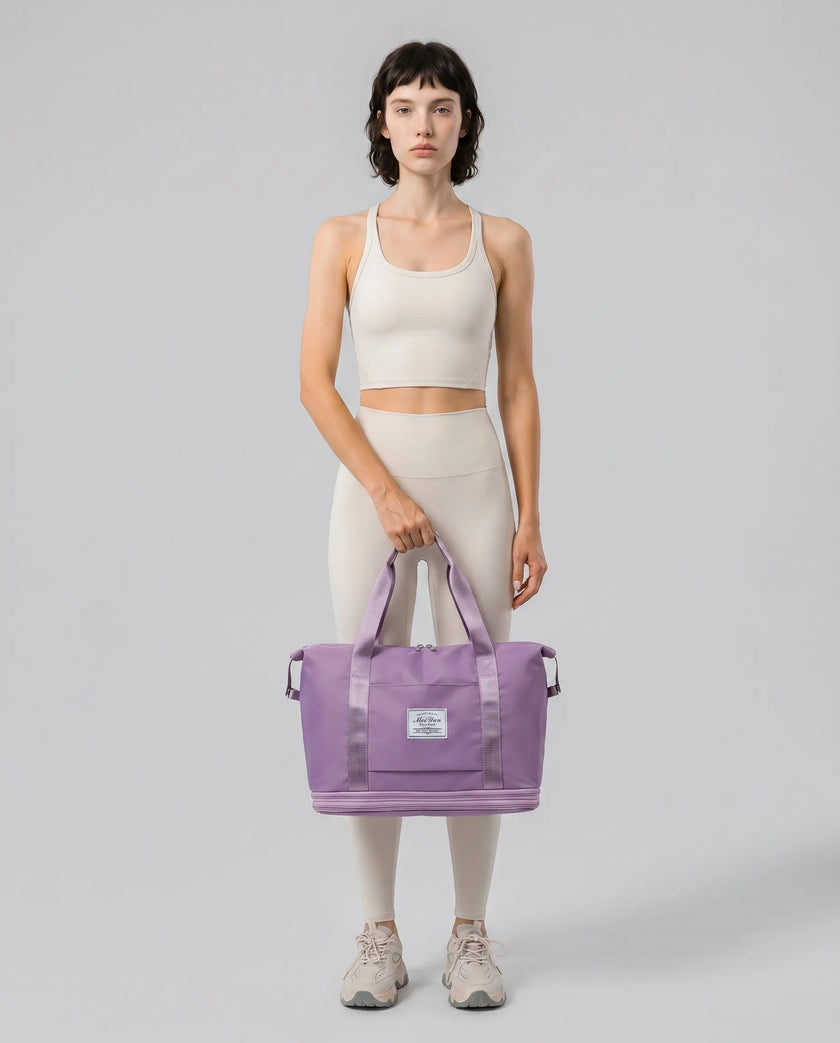 Model carrying ExpandForm Weekender Bag in lavender styled for studio sessions and everyday movements