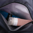 Close-up of ExpandForm Weekender Bag side pocket and zipper detailing