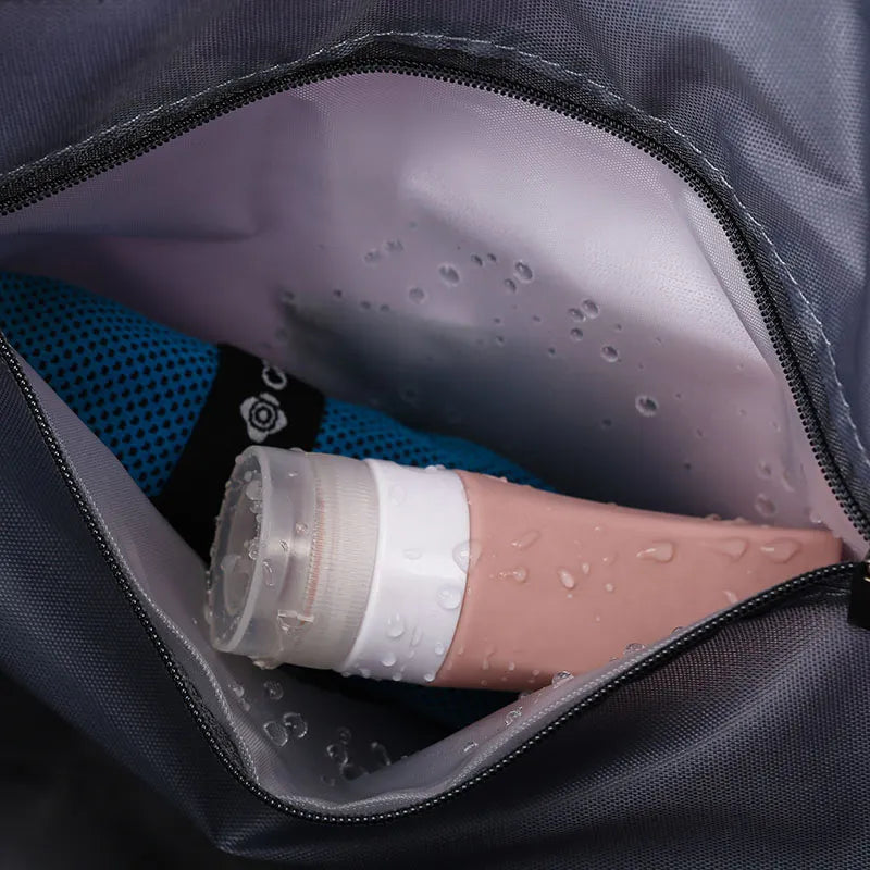 Close-up of ExpandForm Weekender Bag side pocket and zipper detailing
