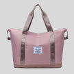 ExpandForm Weekender Bag in moonlit mauve front view with structured silhouette and dual handles