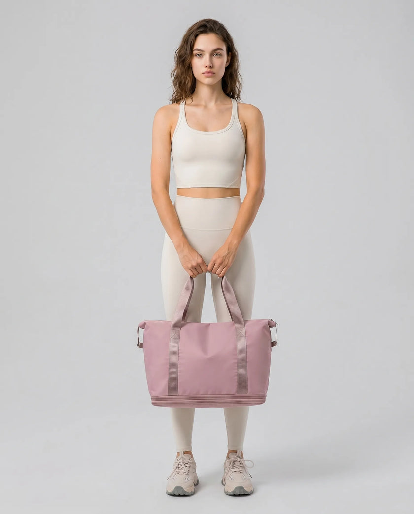 Model carrying ExpandForm Weekender Bag in Moonlit mauve styled for studio sessions and everyday movements