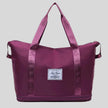 ExpandForm Weekender Bag in plum pruple front view with structured silhouette and dual handles