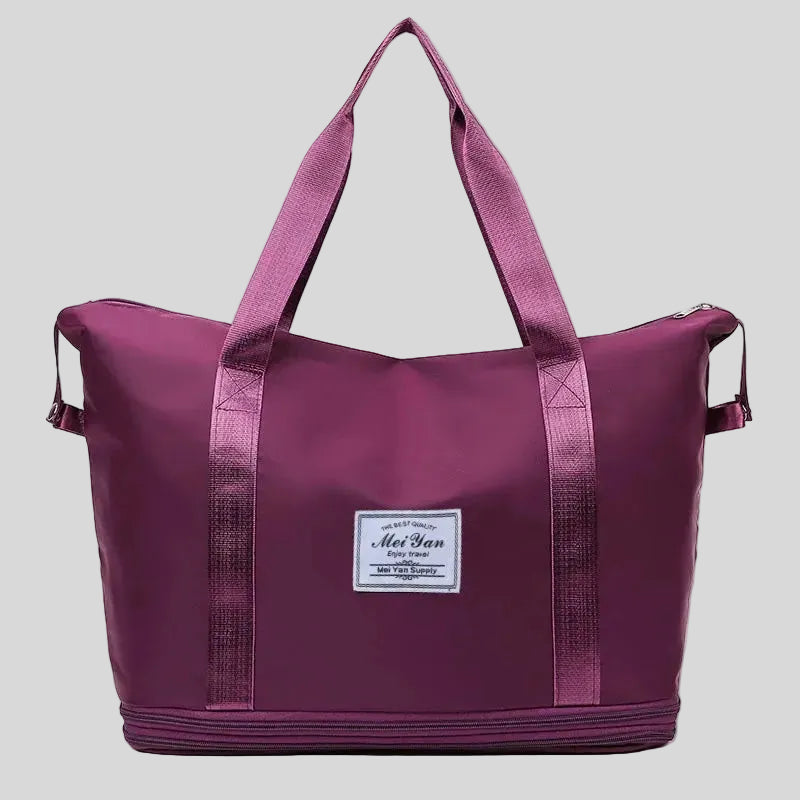 ExpandForm Weekender Bag in plum pruple front view with structured silhouette and dual handles