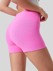 Secure, held-in feel of FlexRise High-Waist Short Legging in Fuchsia Pink - Athlesi