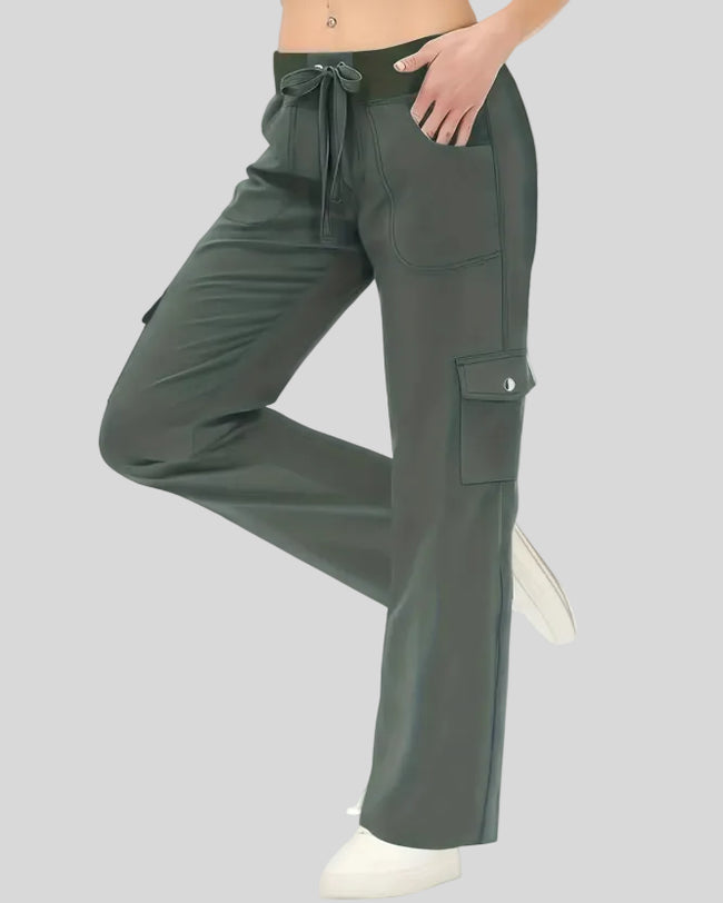 FlowCargo Relaxed Active Pants in Army Green shown from a front angled view with drawstring waist and relaxed fit.