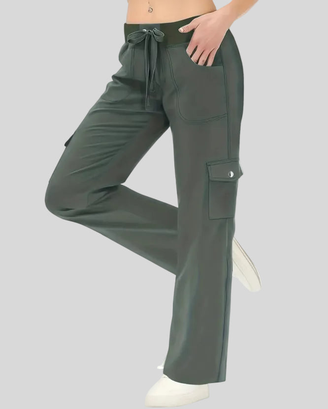 FlowCargo Relaxed Active Pants in Army Green shown from a front angled view with drawstring waist and relaxed fit.
