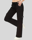 FlowCargo Relaxed Active Pants in Black shown from a front angled view with drawstring waist and relaxed fit.