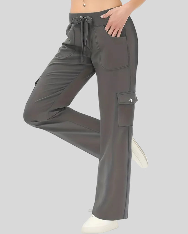 FlowCargo Relaxed Active Pants in Dark Gray shown from a front angled view with drawstring waist and relaxed fit.