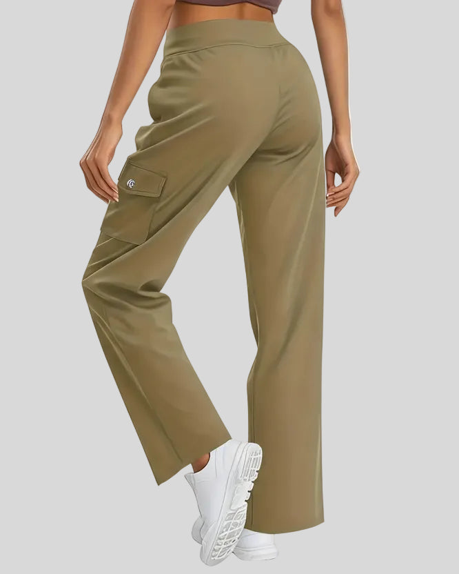 Back angled view of FlowCargo Relaxed Active Pants in Olive showing relaxed silhouette and waistband fit
