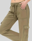 Close-up of drawstring waistband and front pocket detail on FlowCargo Relaxed Active Pants in Olive