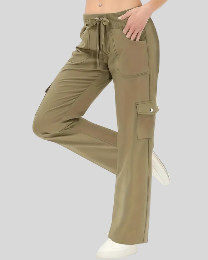 FlowCargo Relaxed Active Pants in Olive shown from a front angled view with drawstring waist and relaxed fit.