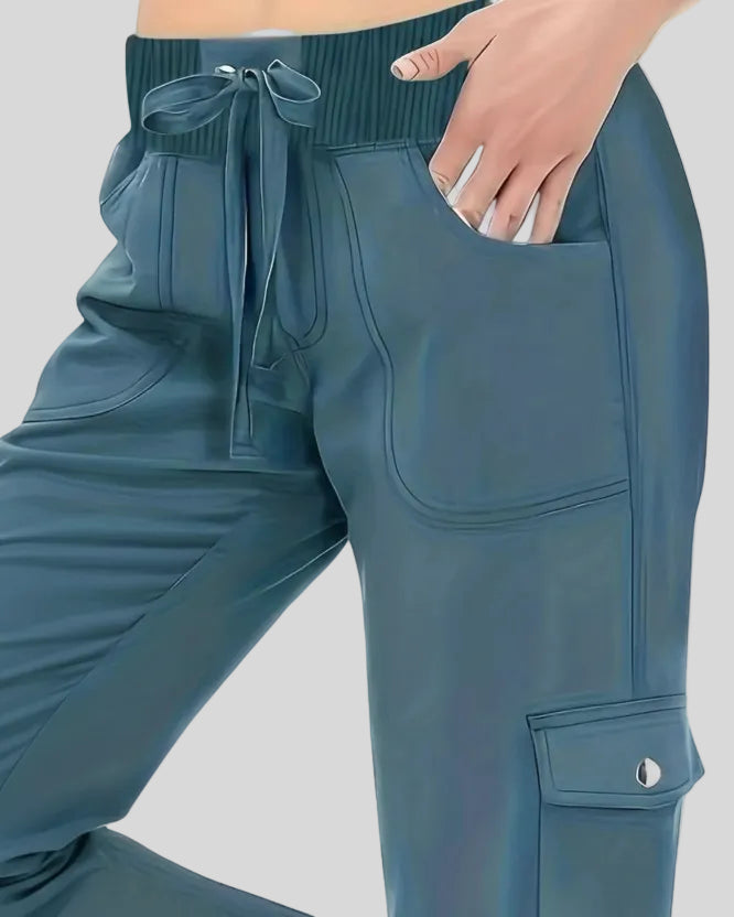 Close-up of drawstring waistband and front pocket detail on FlowCargo Relaxed Active Pants in Sea Blue