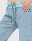 Close-up of drawstring waistband and front pocket detail on FlowCargo Relaxed Active Pants in Sky Blue.