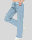 FlowCargo Relaxed Active Pants in Sky Blue shown from a front angled view with drawstring waist and relaxed fit.