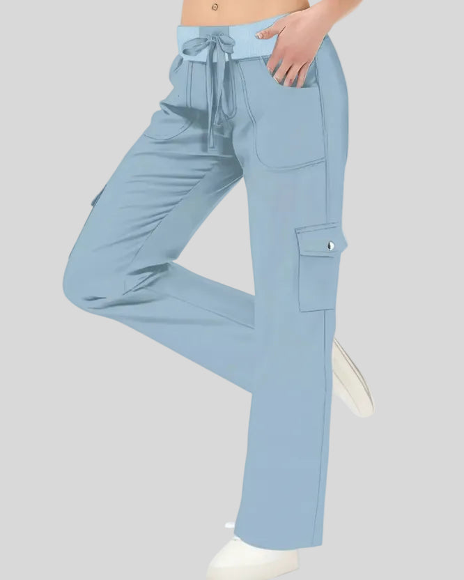 FlowCargo Relaxed Active Pants in Sky Blue shown from a front angled view with drawstring waist and relaxed fit.