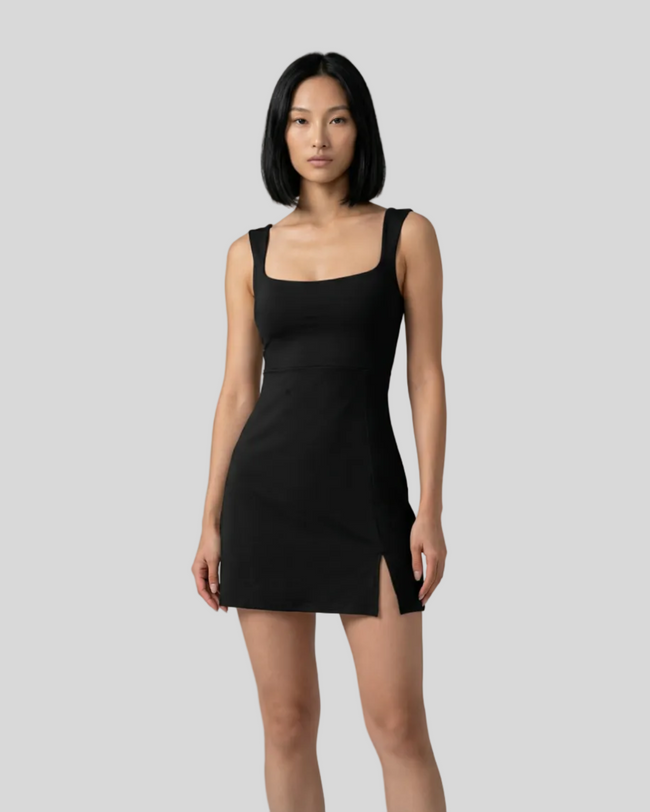 Front view of model wearing FlowCourt square-neck seamless active dress in black