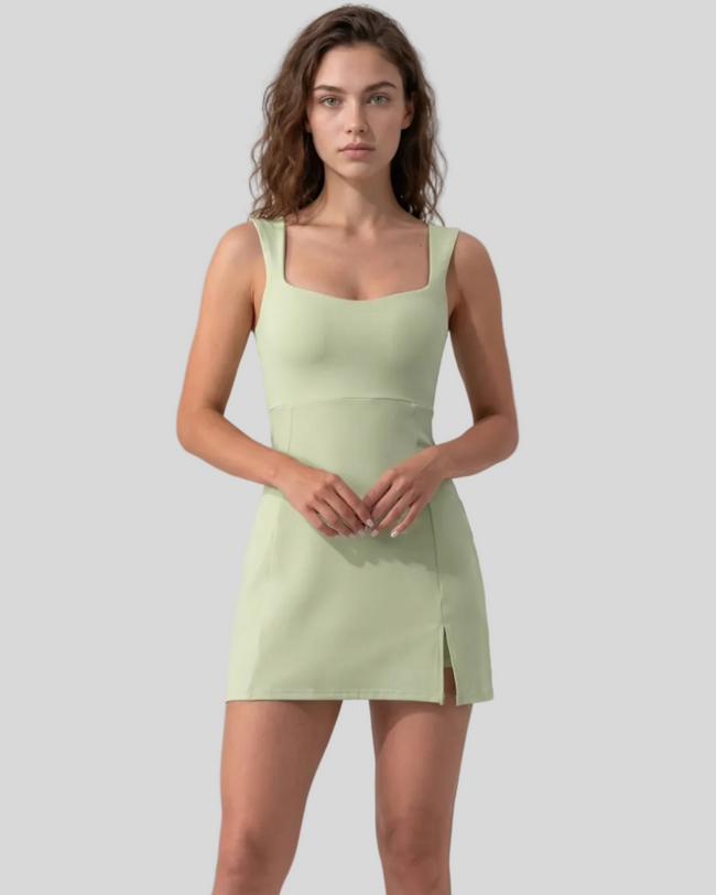 Front view of model wearing FlowCourt square-neck seamless active dress in light green