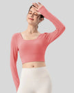 Athlesi FlowCross long sleeve square-neck active top in hot pink, angled front view