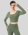 Athlesi FlowCross long sleeve square-neck active top in matcha green, angled front view