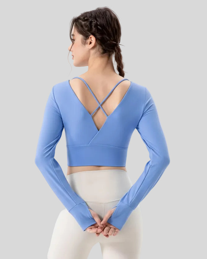 Athlesi FlowCross studio top in sky blue featuring crisscross back detail