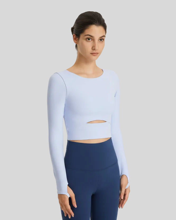 Sky blue FlowCut Studio Top angled view with long sleeves