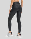 Back angle view of black FlowEase High-Waist Pocket Legging with seamless silhouette