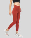Right side view of brick red FlowEase High-Waist Pocket Legging with invisible pocket design
