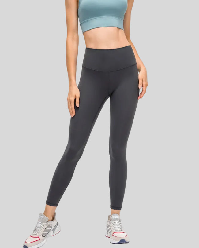 Front angle view of FlowEase High-Waist Pocket Legging with smooth high-rise waist