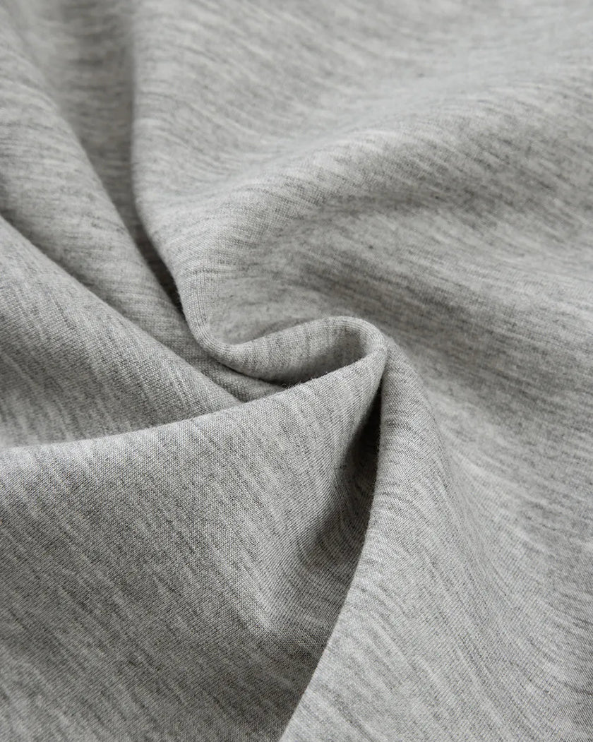 FlowEase Hybrid Active Pant gray fabric closeup showing soft drape texture