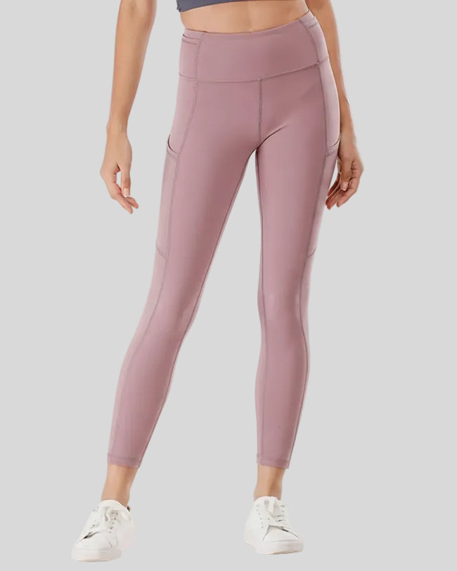 Front view of Athlesi FlowEase Pocket Legging in dusty pink with a soft, high-waist silhouette.