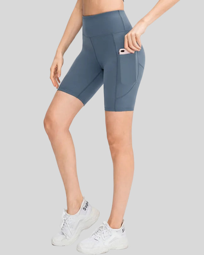 Athlesi FlowEase pocket short in light blue, front angle view