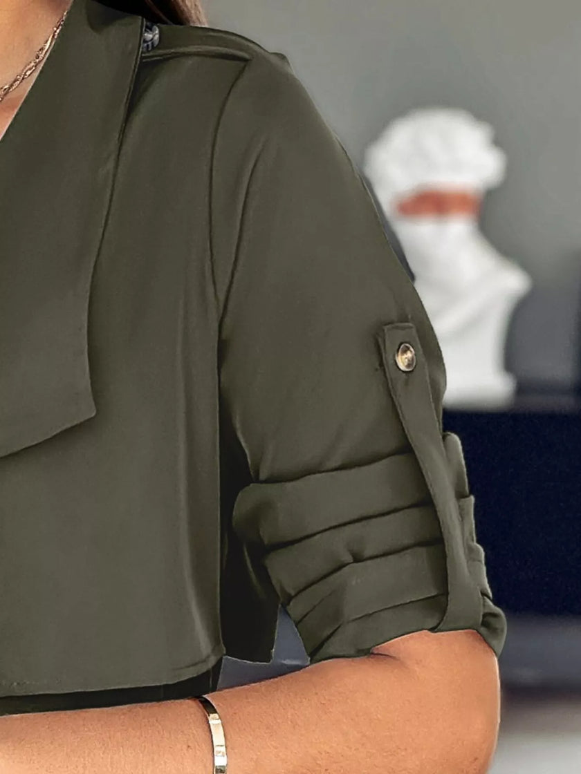 Athlesi FlowForm trench army green closeup showing fabric texture and sleeve detail