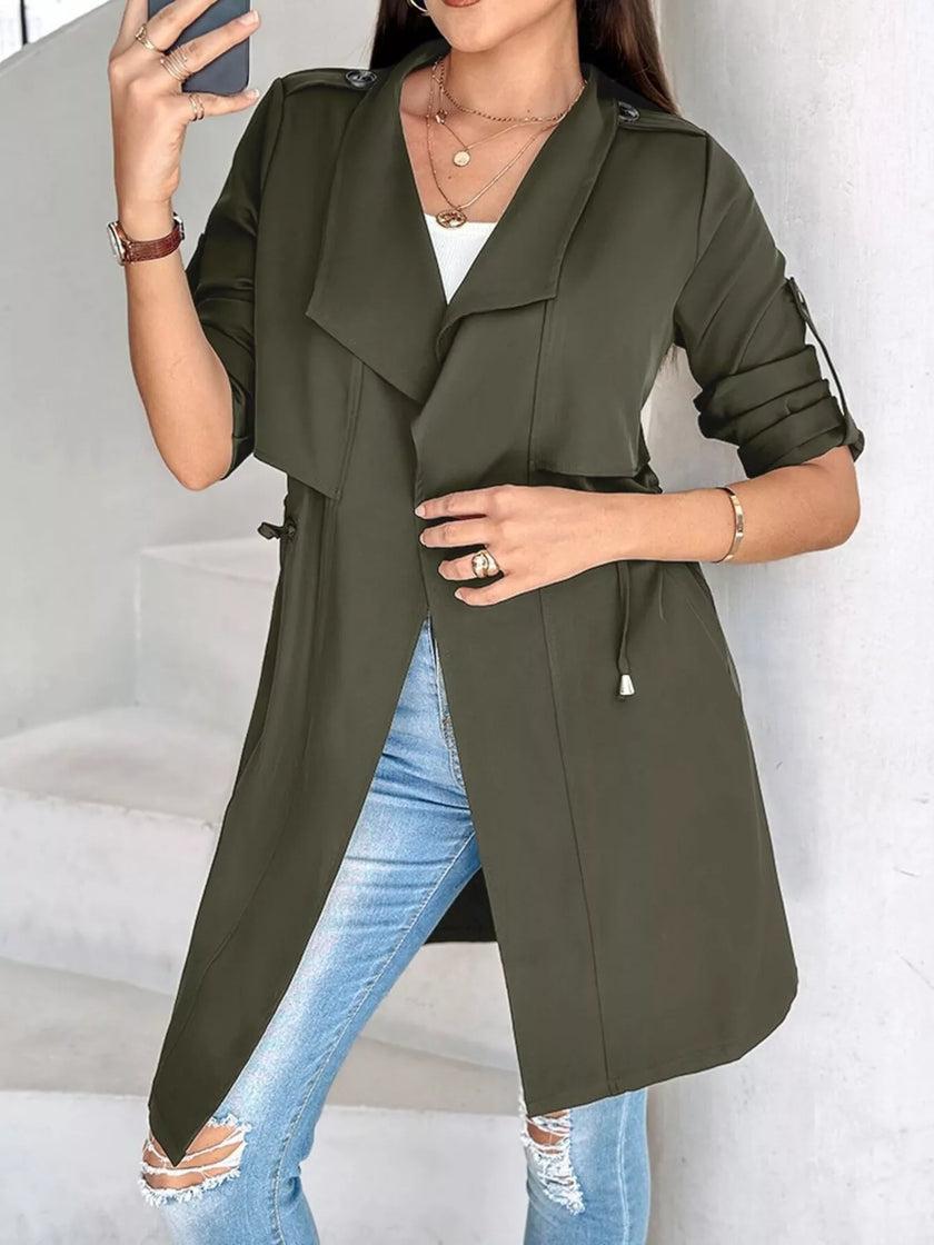Athlesi FlowForm trench army green angled front view highlighting drape collar and relaxed fit
