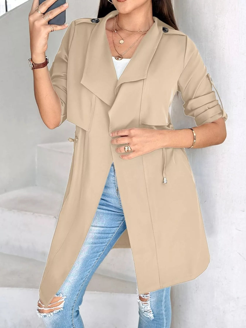 Athlesi FlowForm trench khaki angled front view highlighting drape collar and relaxed fit