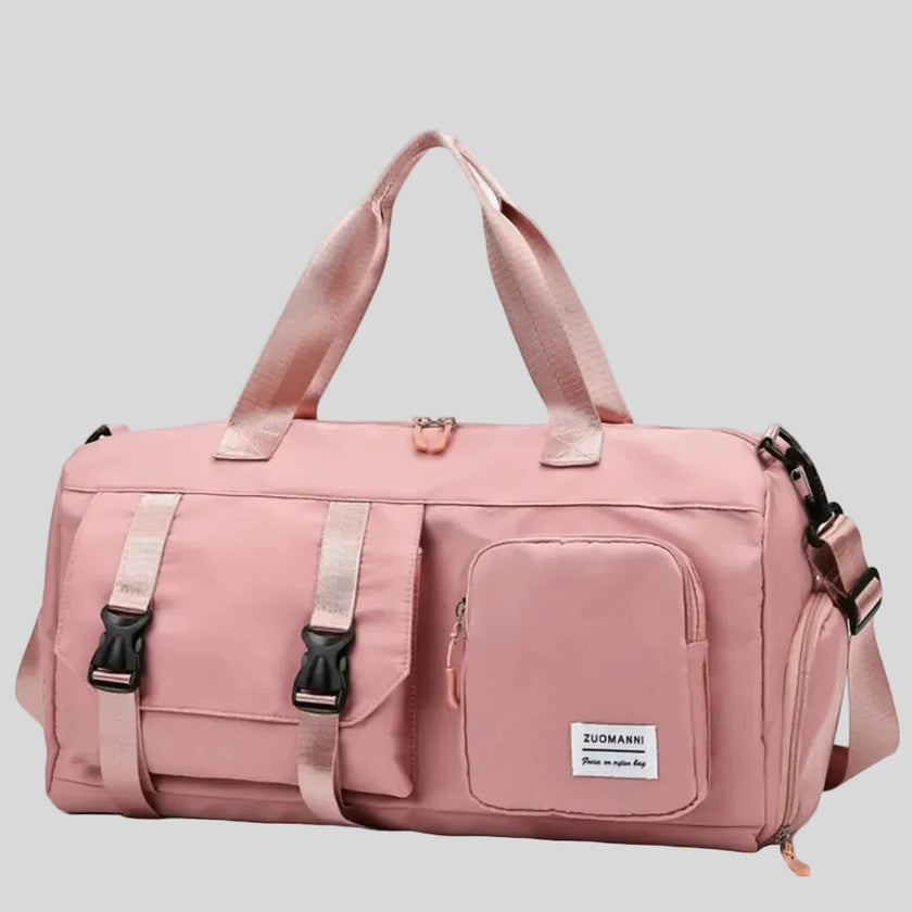 FlowHold Carry Bag in burnt coral with structured design and front utility pockets