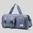 FlowHold Carry Bag in light indigo with structured design and front utility pockets