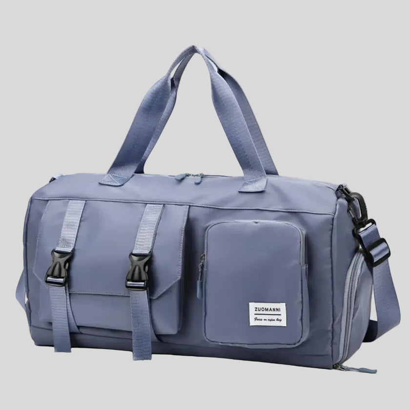 FlowHold Carry Bag in light indigo with structured design and front utility pockets