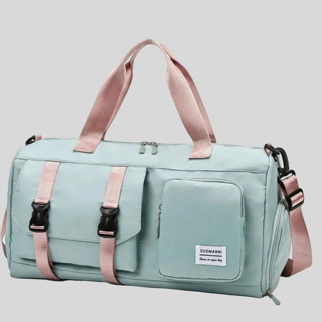 FlowHold Carry Bag in turquoise with structured design and front utility pockets