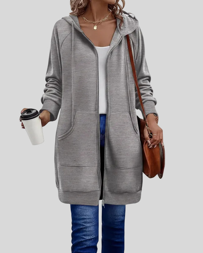 Longline zip-up hoodie in gray, worn open mid body view showing relaxed fit and front pockets