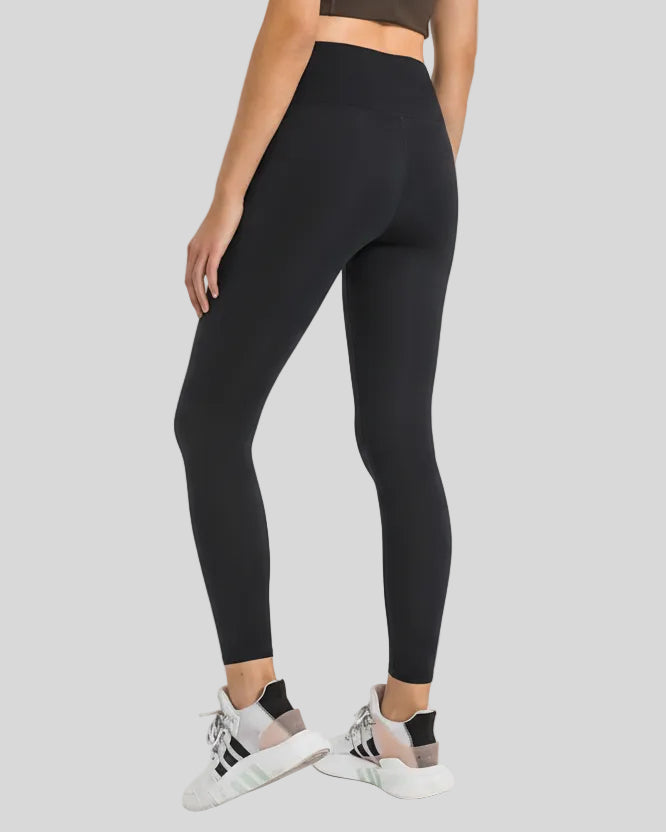 Back view of Athlesi FlowLine Core legging in black