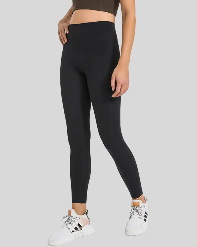 Athlesi FlowLine Core legging in black, front view