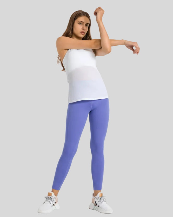 Angled front view of Athlesi FlowLine Core legging in blue purple
