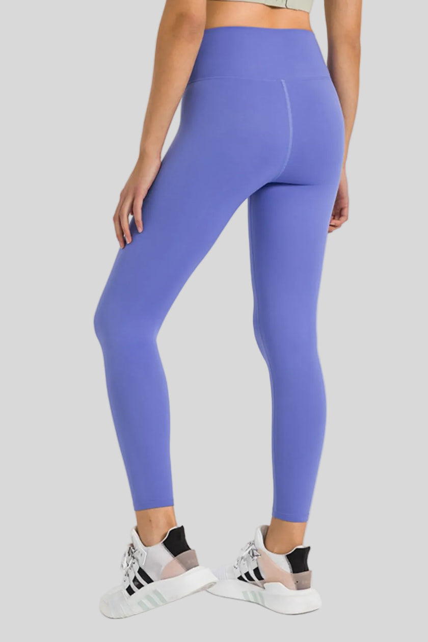 Back view of Athlesi FlowLine Core legging in blue purple