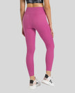 Back view of Athlesi FlowLine Core legging in cerise