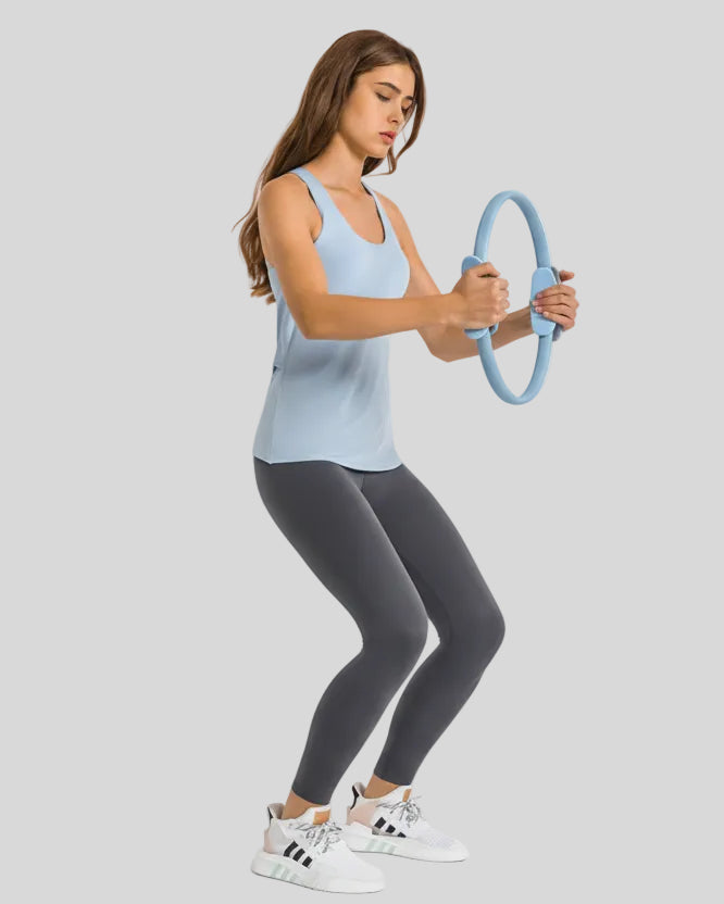 Side view of Athlesi FlowLine Core legging in dark gray