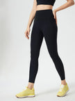 Left side view of black FlowLine Core Legging with smooth silhouette