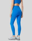 Back angle view of FlowLine Core Legging in blue