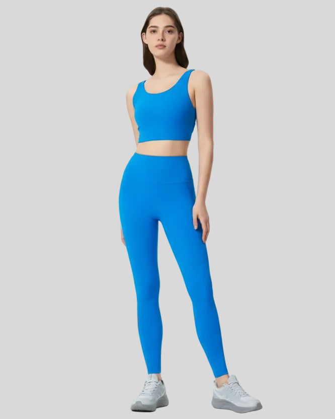 Full body front view of FlowLine Core Legging in blue
